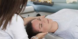 chiropractor adjusting patient's spine