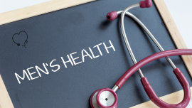 men's health note with stethoscope